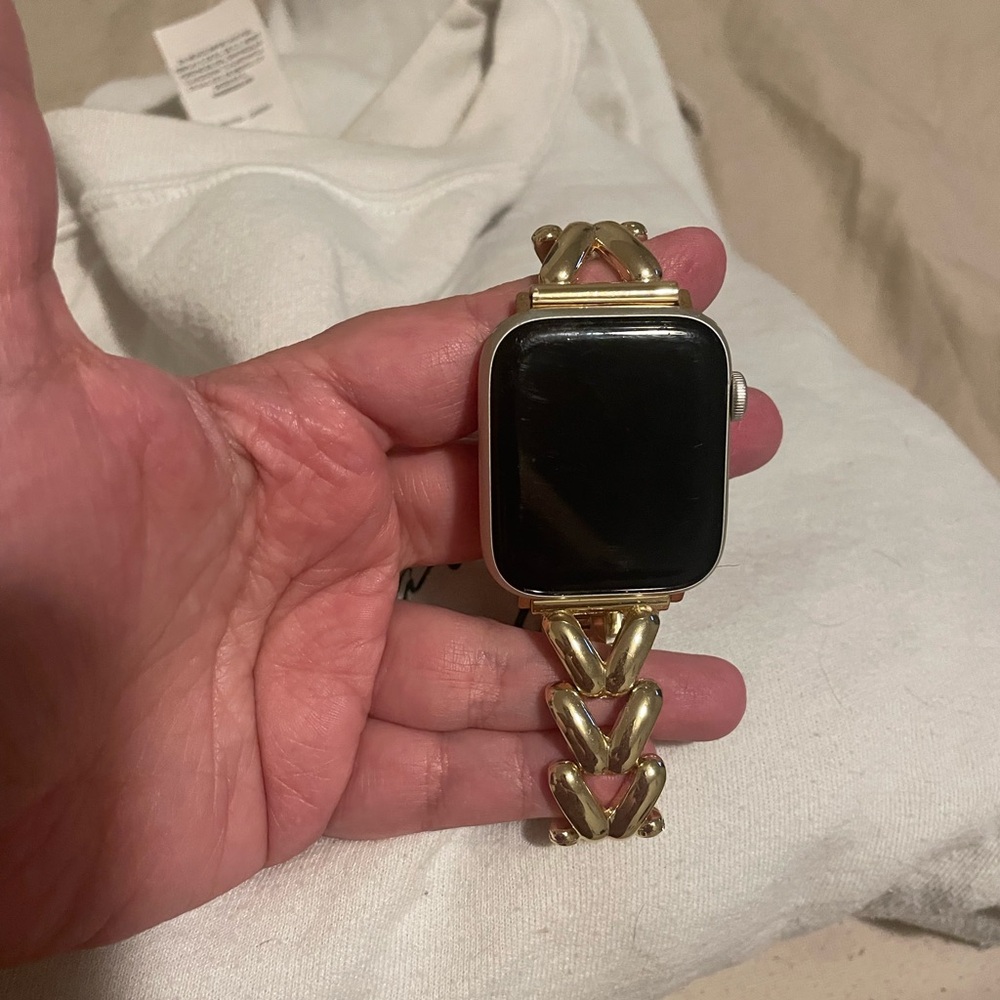 Apple Smartwatch with Gold and Black Band